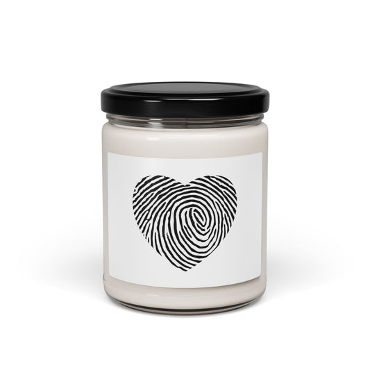 Soy Candle 9oz Heart Fingerprint by Mariu del Campo — candle lit, warm glow lifestyle