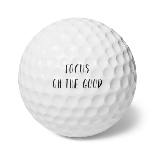 Golf Balls, 6pcs Focus on the Good by Mariu del Campo.