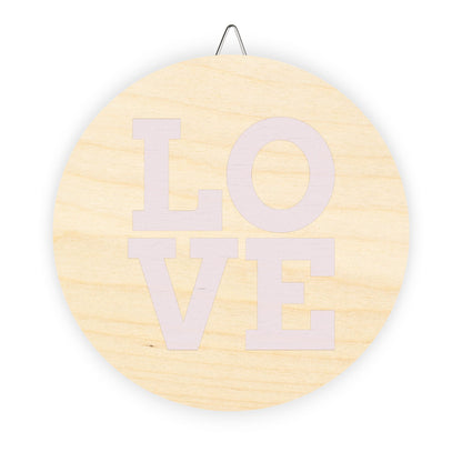 Signs love in Wood by Mariu del Campo.