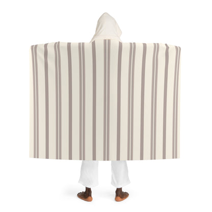 Blanket Hooded Sherpa Striped by Mariu del Campo — model wrapped in blanket